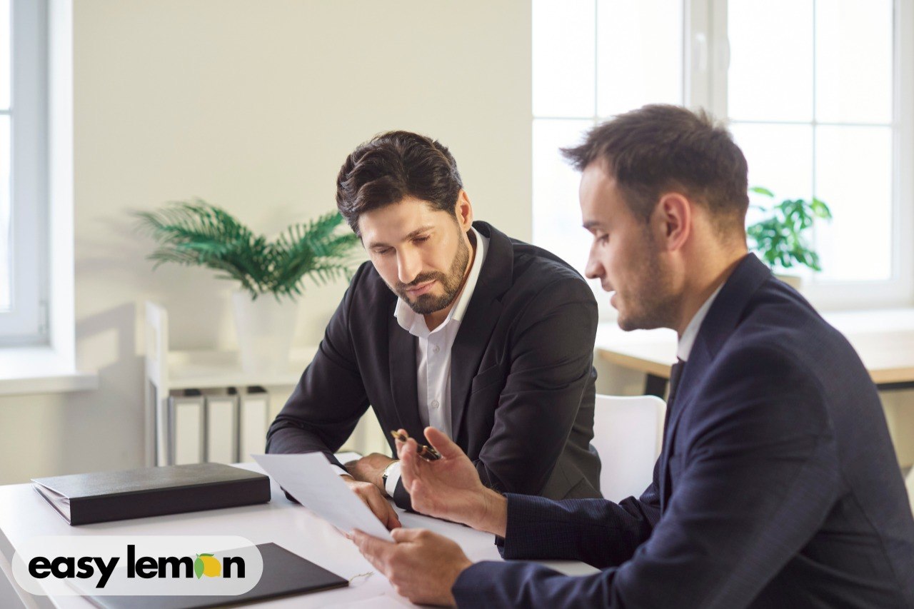 Vehicle owner discussing Dodge Ram transmission problems with a lemon law attorney