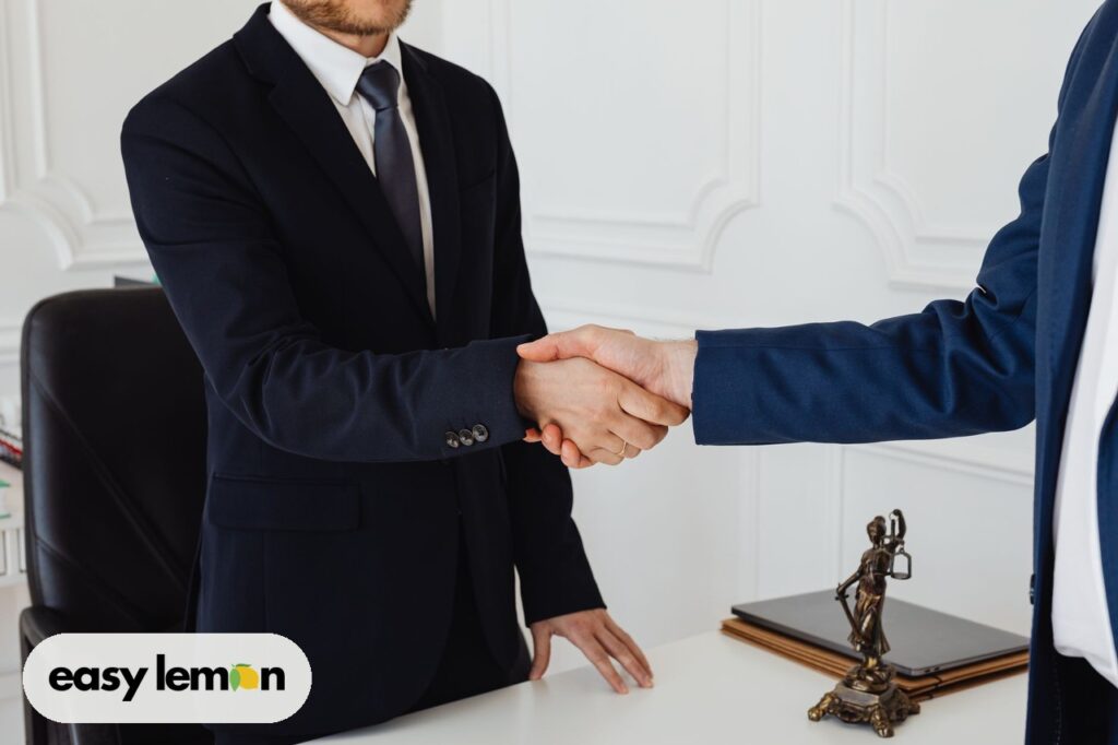 Attorney handshake offering help when car recalls last too long