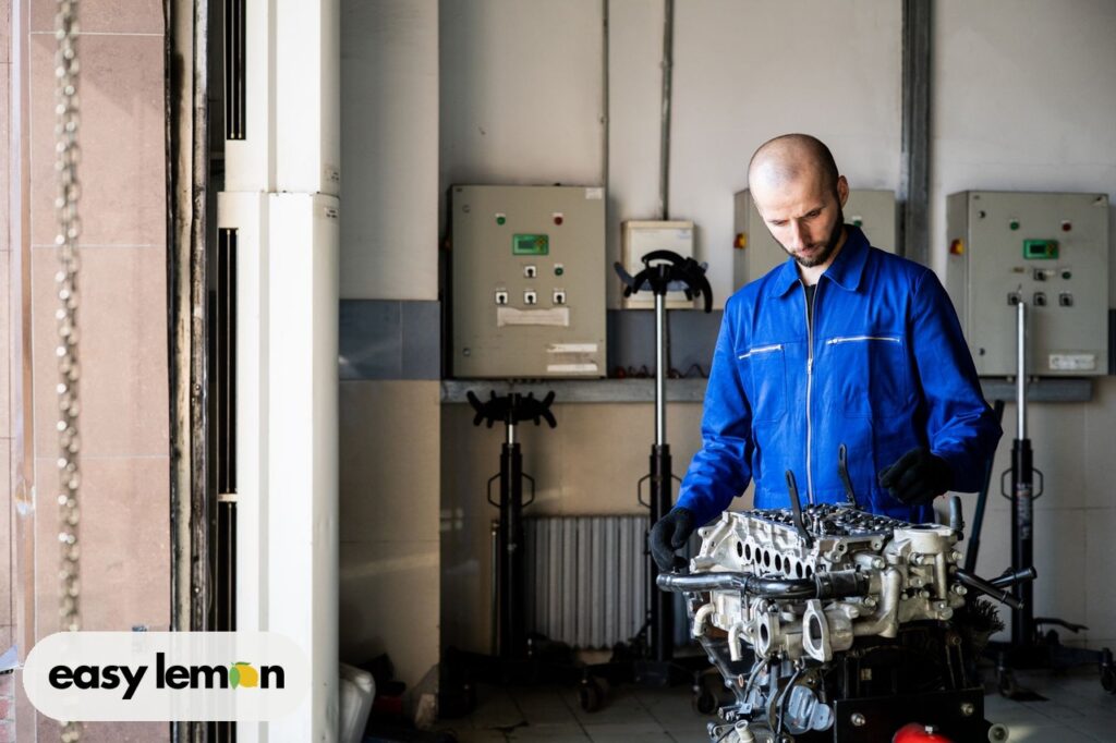 Technician performing a recall repair, showing how long car recalls last