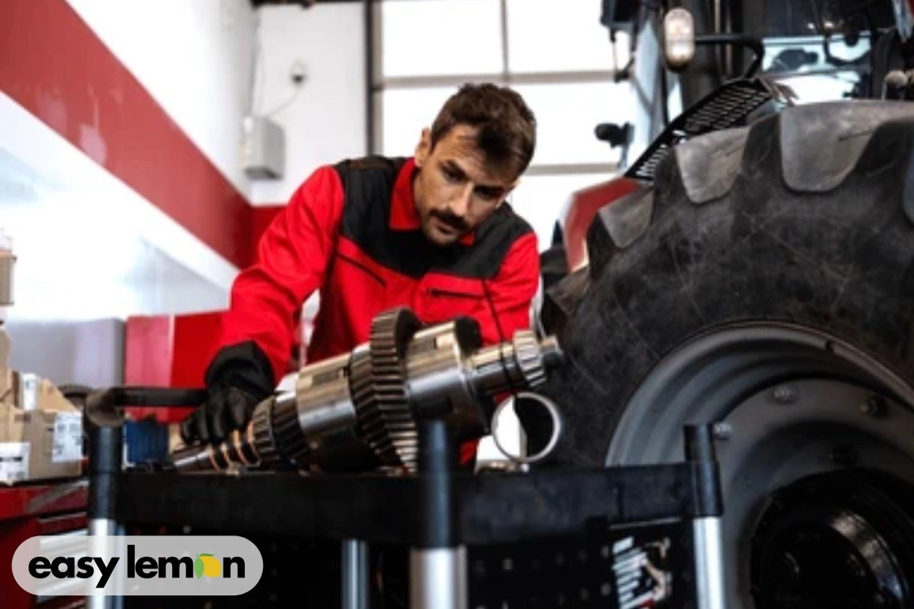 Mechanic repairing a Dodge Ram transmission system