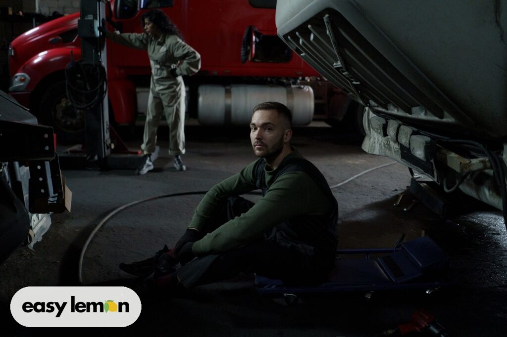 Mechanics inspecting a truck for RAM Hurricane engine problems